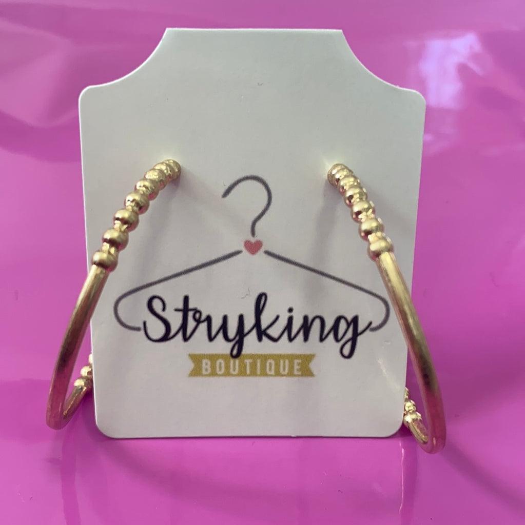 Hooped up earring
